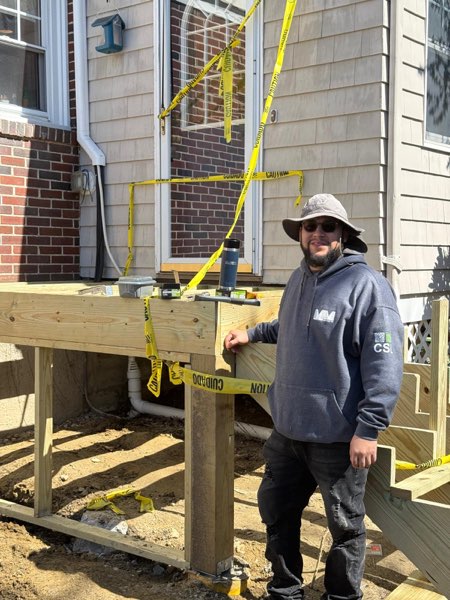 Manny, owner of MM Services CSL, on site at a deck project in Greater Boston